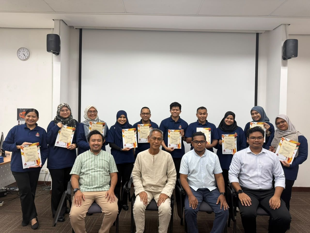 Participants receiving their certificates